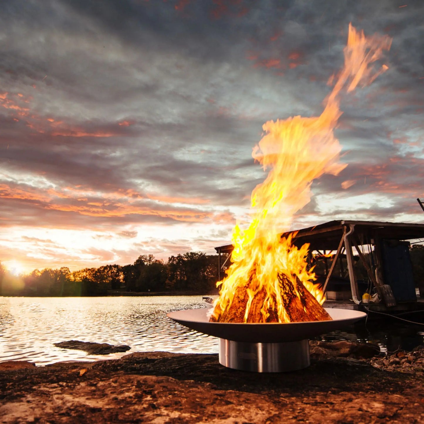 Fire Pit Art Bella Vita 70-Inch Stainless Steel Fire Pit – Extra Large Luxury Outdoor Fire Bowl – Lifestyle View