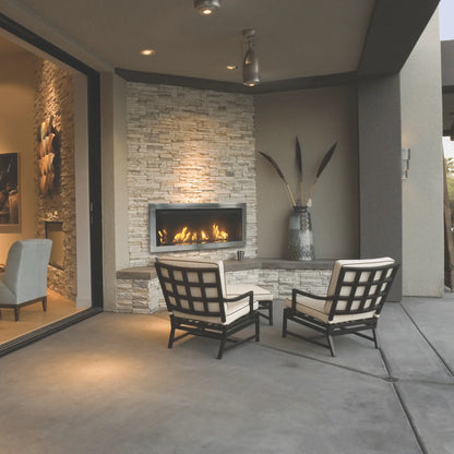 Sierra Flame Tahoe 45 outdoor gas fireplace in a stacked stone wall on a covered patio