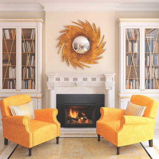 Sierra Flame Abbot 30 gas fireplace insert in a white mantel between two orange armchairs
