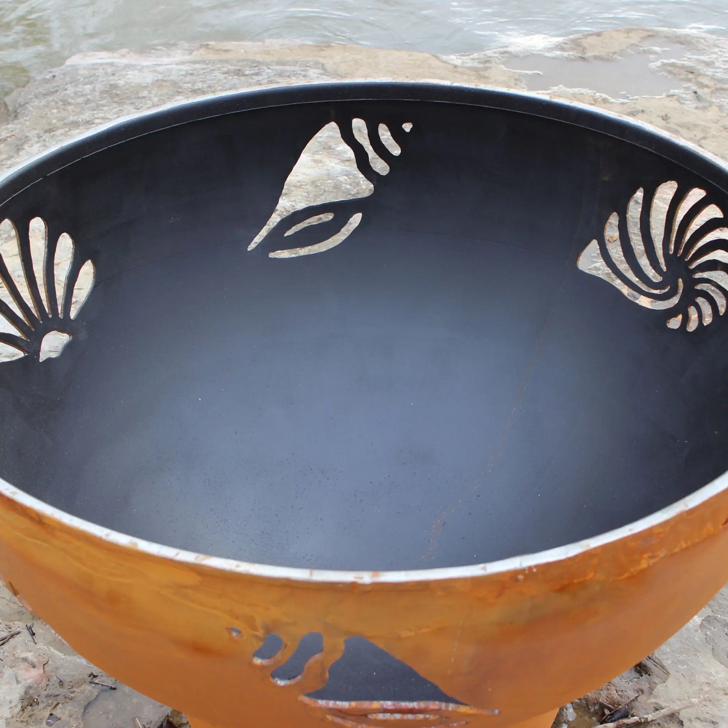 Fire Pit Art Beachcomber Steel Fire Pit – Conch Nautilus Scallop Shell Design Outdoor Fire Pit – Lifestyle View