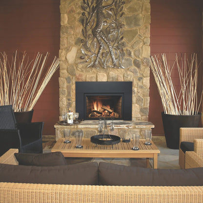 Sierra Flame Abbot 30 direct vent gas insert in a stone masonry fireplace