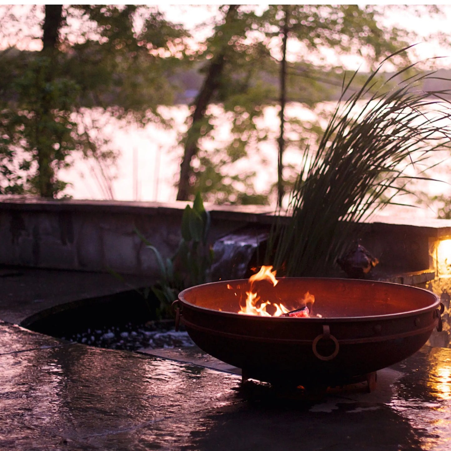 Fire Pit Art Emperor Steel Fire Pit – Medieval Riveted Design Outdoor Wood Burning Fire Pit – Lifestyle Outdoor Setting