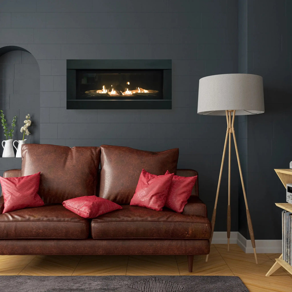 Sierra Flame Stanford linear gas fireplace on a dark gray wall above a leather sofa