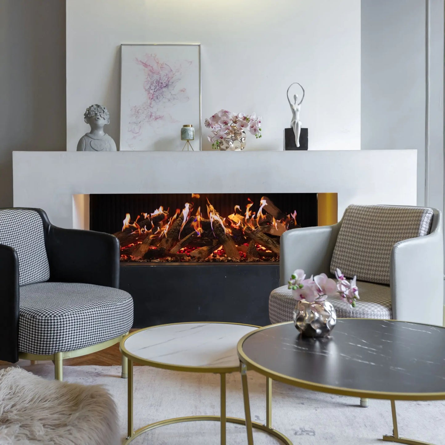 Modern living room with a fireplace, chairs, and decorative elements.