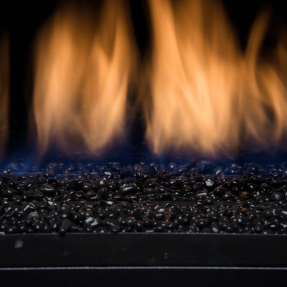 Close-up of gas flames over black glass media in a Sierra Flame Palisade fireplace