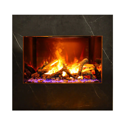 A modern electric fireplace insert with glowing orange and yellow flames, faux logs, and purple glass stones, set within a dark charcoal marble-look surround.