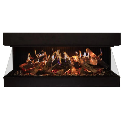 A modern linear fireplace with a black metal frame, clear glass side panels, and realistic logs with glowing orange and yellow flames over dark embers, shown against a plain white background.