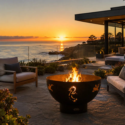Outdoor fire pit at sunset by the ocean. 